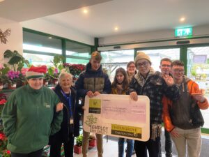 Thorngrove students presenting cheque to dementia fundraising  300x225