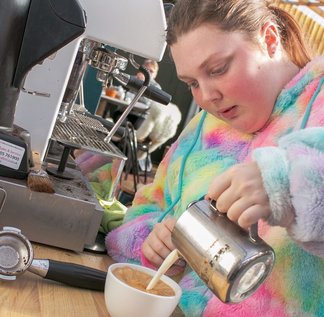 EMA Gillingham student working in Gillingham Cafe making a cup of tea